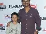 AR Murugadoss arrives with his son for the 62nd Britannia Filmfare Awards