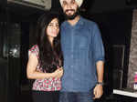 Divya and Achint pose together during a party
