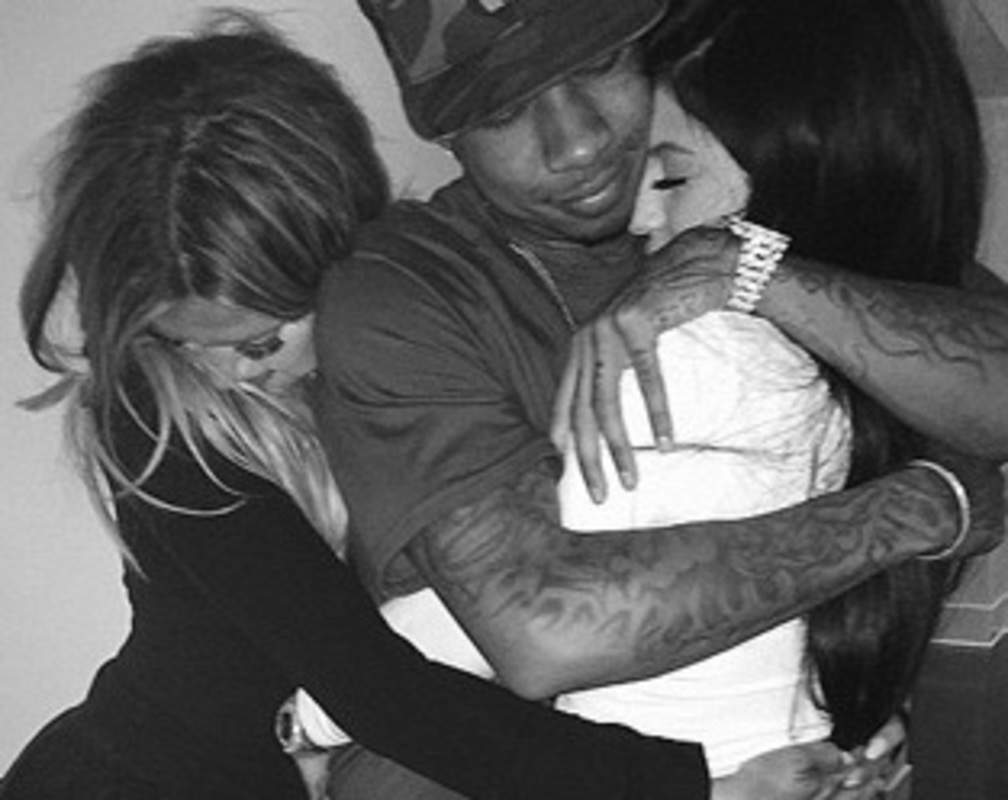 
Khloe Kardashian joins Kylie Jenner and Tyga in sandwich hug
