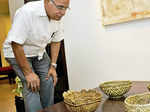 RK Sinha admires creations during a painting exhibition