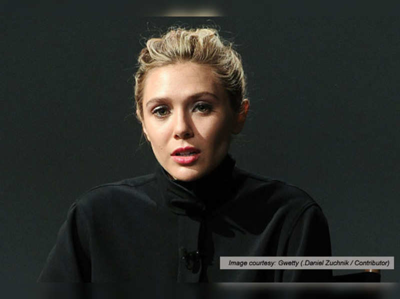 Paris Elizabeth Olsen Suffers Wardrobe Malfunction In Paris English 