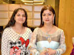 Vaishali and Sapna pose during a party