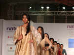 Models walk the ramp during the Chennai Fashion week