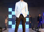 A model walks the ramp during