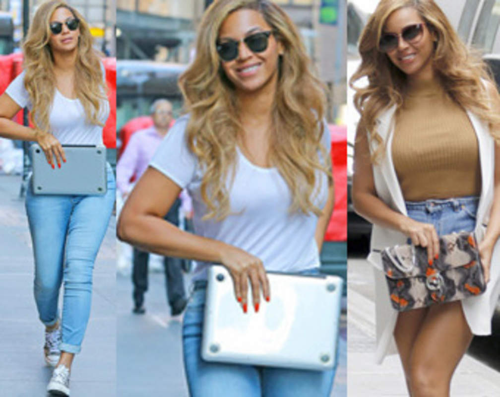 
Why is Beyonce hiding her tummy?
