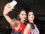 Devika (L) and Garima during a party