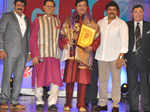 Celebs pose on stage during TSR TV9 National Film Awards