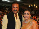 Mohan Babu poses with Raveena Tandon during TSR TV9 National Film Awards