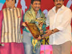 Chiranjeevi presents an award during TSR TV9 National Film Awards