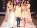 Rehane walks the ramp with models