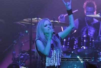 Avril Lavigne performs at Special Olympics opening ceremony