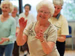 An elderly woman dances