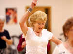 An old women dances with zest