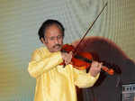 Indian classical violinist L Subramaniam performs during the music launch