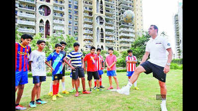 EPL footballer teaches kids football in Gurgaon