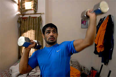 Snapshot: Wrestler Sushil Kumar trains with his 19-month-old twins