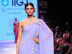 A model showcases a creation by IIGJ Jaipur