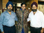 Siddhesh Pai poses with designers Ravinder and Tajinder Singh