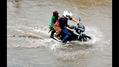 Traffic crawled as roads turned rivers in Delhi