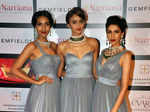Guests pose for a photo during the Retail Jeweller India
