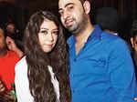 Devina and Akshay Anand pose together during a Sufi Friday night