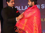 Siddharth felicitates Sanjeev Gupta during Gollapudi Srinivas National Awards