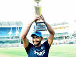 Skipper Unmukt Chand holds the winning trophy
