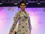 A model walks the ramp during Melange 2015