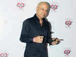 Naved Jaffery gestures as he arrives for the birthday party