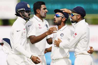 Bowlers help India keep noses ahead