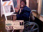 This handicapped beggar has some great sense of humour