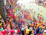 Hindu devotees perform a holy dip