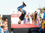 A participant performs stunt during Raahgiri Day celebrations