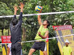 Participants play volleyball during Raahgiri Day