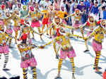 Artists with their body painted as tiger dance during the 'Pulikali'