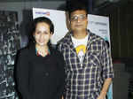 Irshad Kamil poses with a guest during the screening
