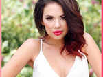 Janel Parrish looks beautiful in red lipstick.