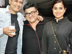 AD Singh and Simone Singh pose with a friend