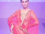 ​A model walks the ramp during a fashion show