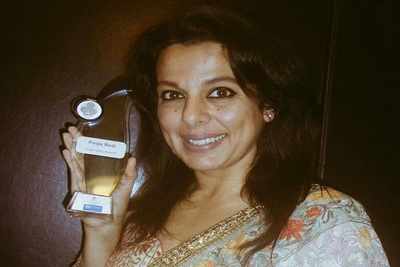 Pooja Bedi bags an award her column Heart Chakra