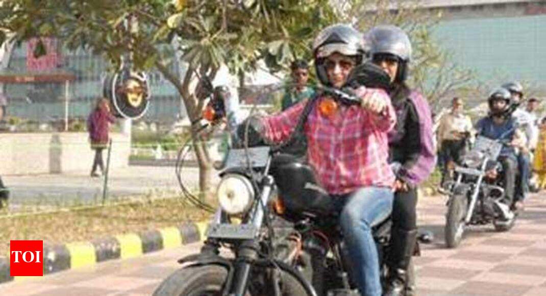 Give 2 helmets with every new bike, says Madras HC Chennai News