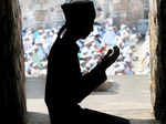 A Muslim man offers Eid al-Adha prayers
