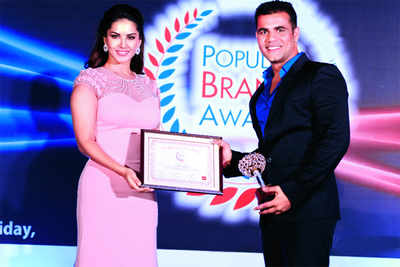 Sunny Leone presents the Promising Face of The Year Award 2015 to Rohit Sethi in Mumbai
