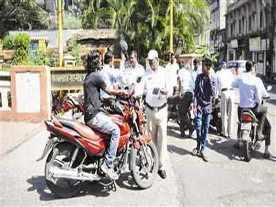 Real penalty for not wearing helmet: 10-day wait for licence - Times of