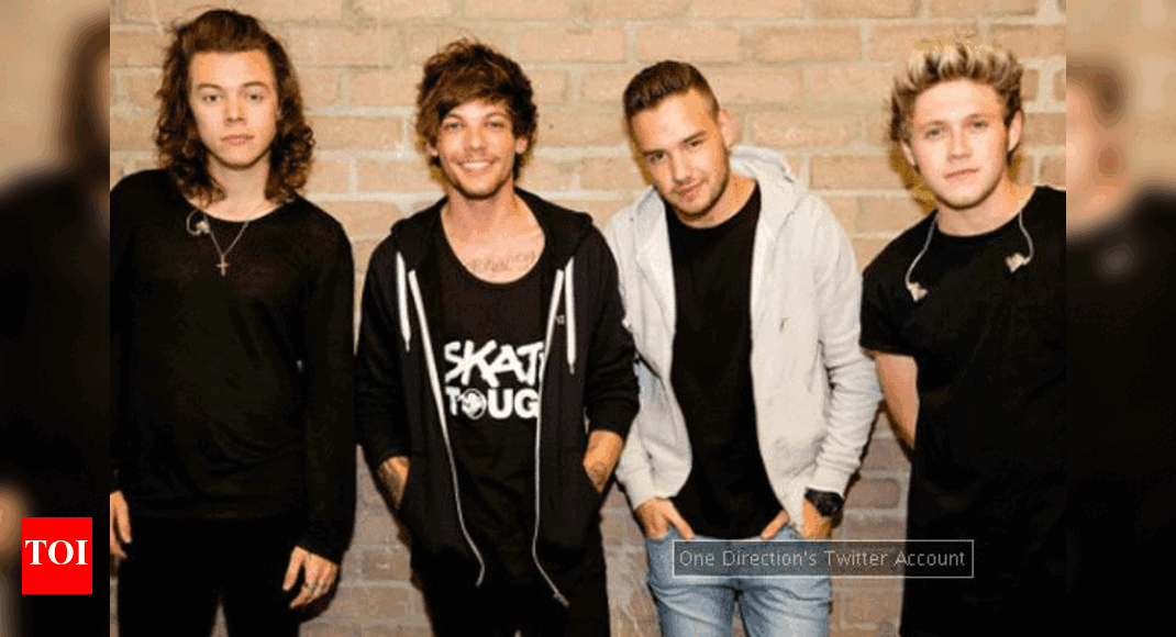 One Direction present mentor Simon Cowell with top Music Industry Award ...