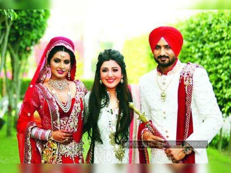 Geeta Basra and Harbhajan Singh look 
