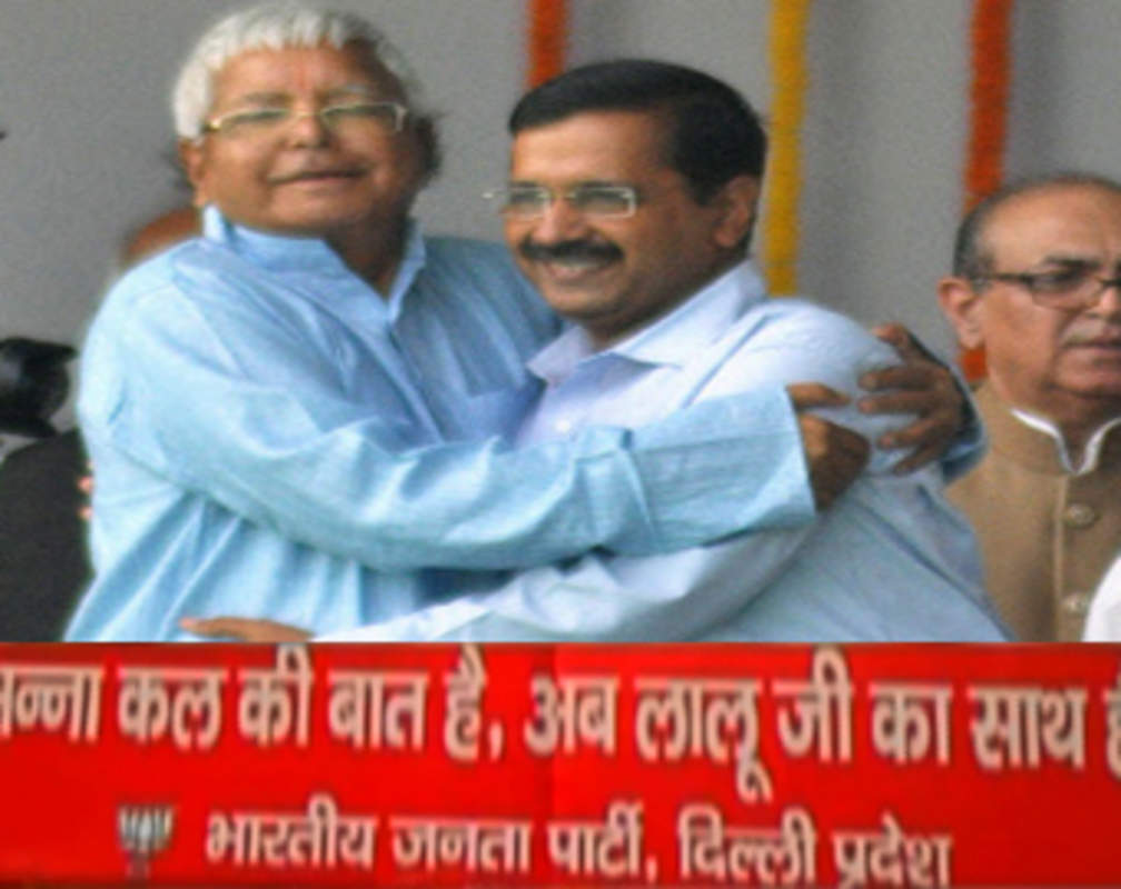 
Arvind Kejriwal's hug with tainted Lalu Prasad, BJP puts posters in Delhi

