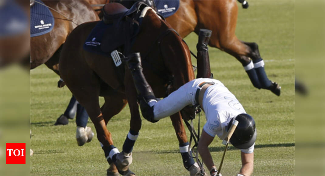 Prince Harry falls from polo pony at charity match in South Africa ...