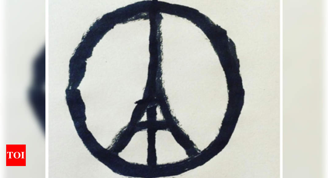 Pray for Paris: Eiffel Tower peace sign emerges as symbol of