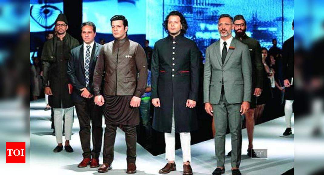 Sarod maestros Amaan and Ayaan Ali Khan walk the ramp at GQ Fashion